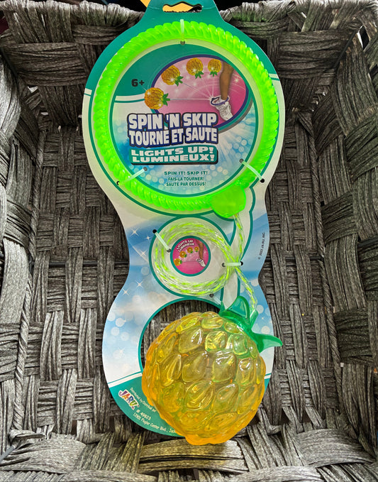 SPIN 'N SKIP LIGHT UP PINEAPPLE TOY