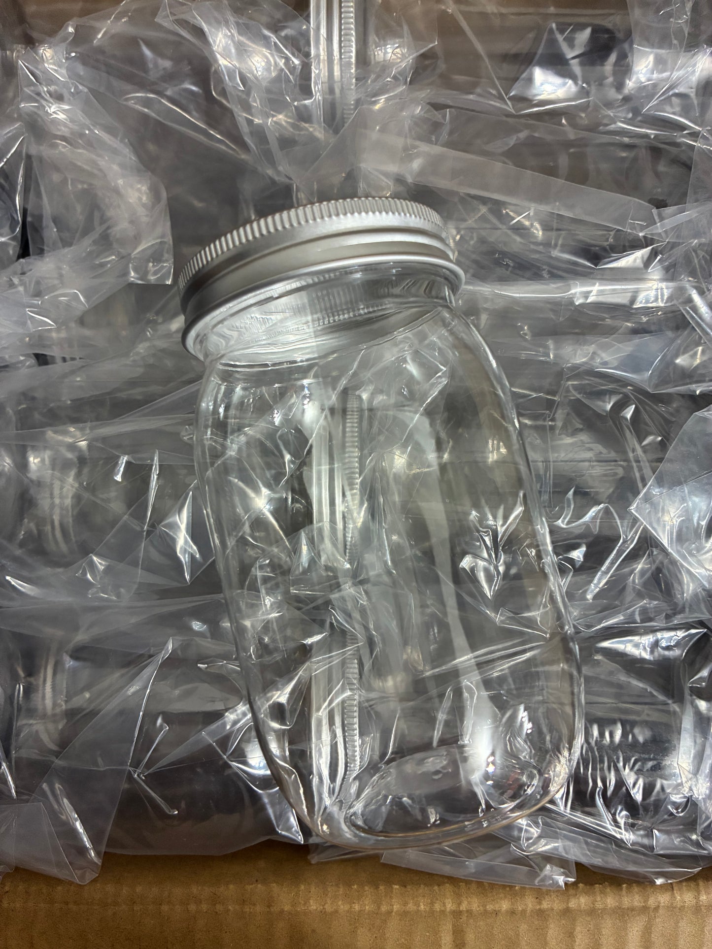 CLEAR PLASTIC JAR WITH SLOTTED LID