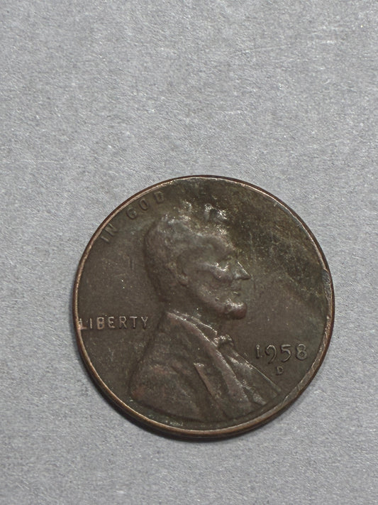1958 D PENNY OFF CENTER "L" ON RIM 95% COPPER - CIRCULATED (LN0034)