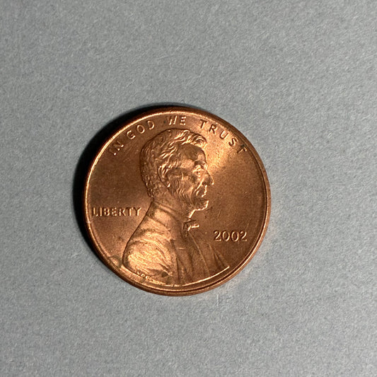 2002 PENNY NO MINT MARK AM TOUCHING