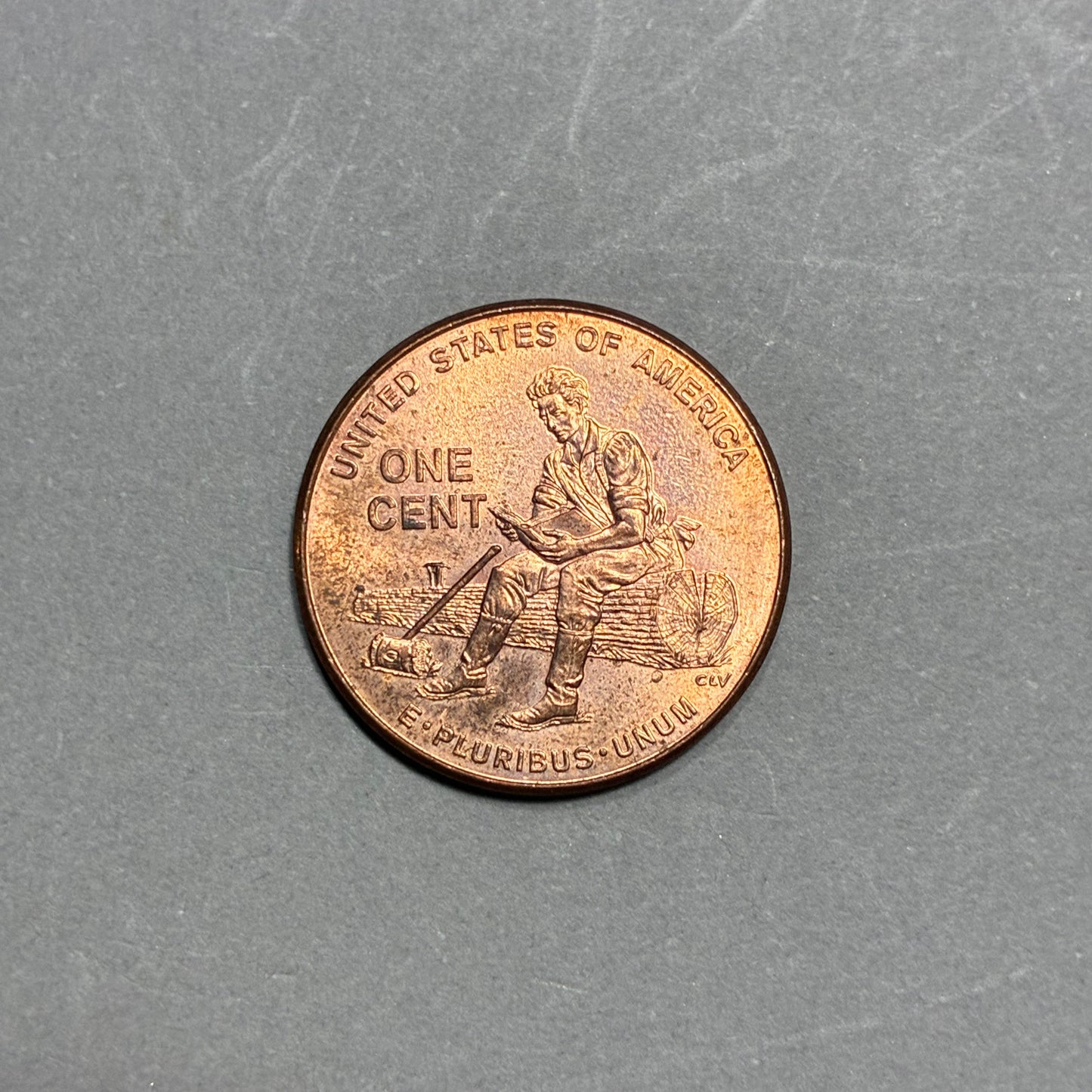 2009 PENNY NO MINT MARK SITTING ON A LOG