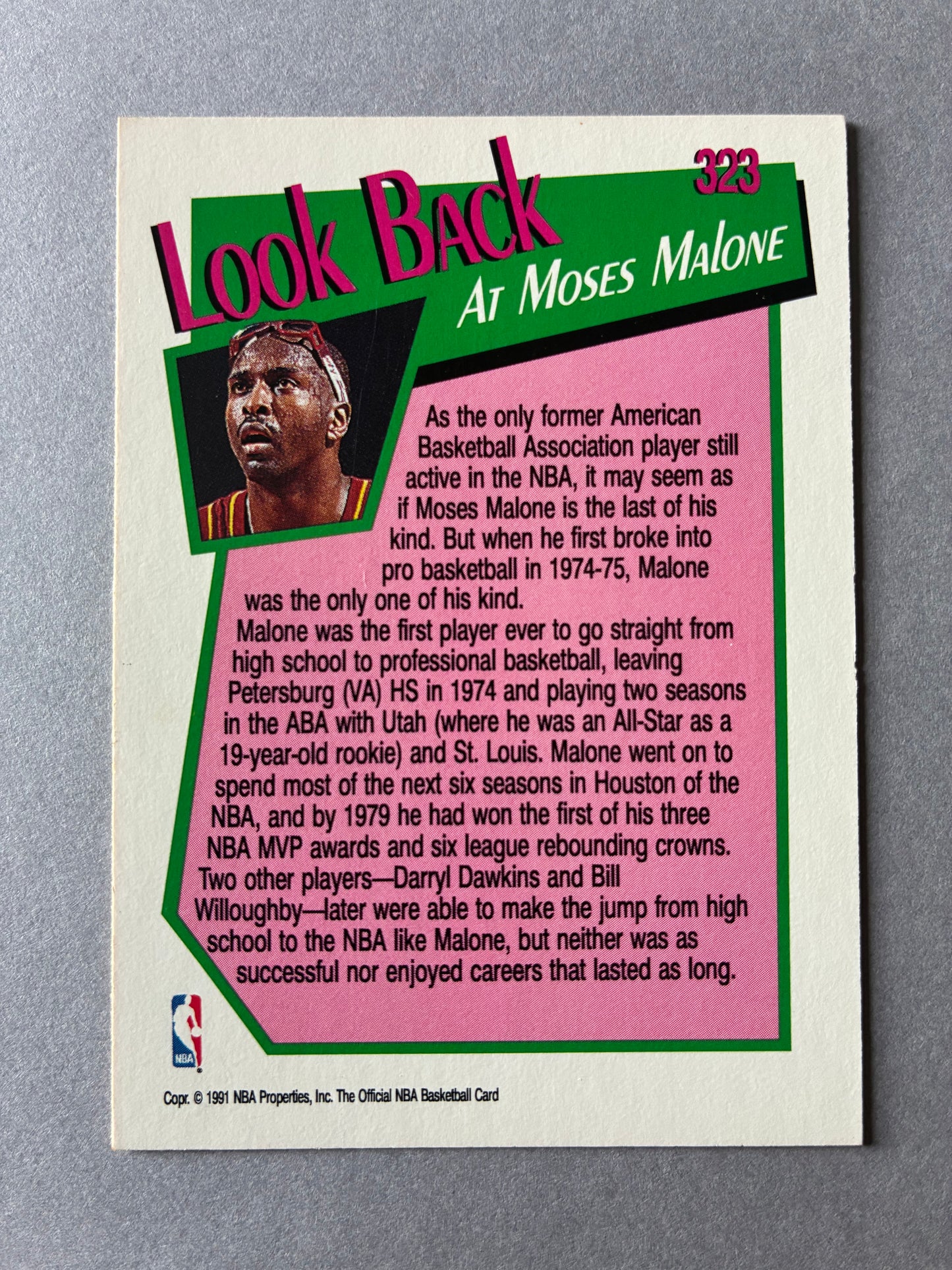 1991 NBA HOOPS (NBA YEARBOOK CLASS OF 74) - MOSES MALONE #323 (HOUSTON ROCKETS)